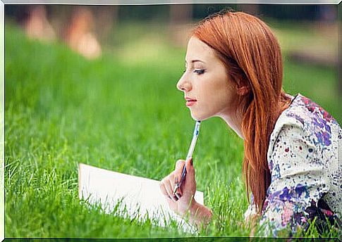 Woman writing a diary