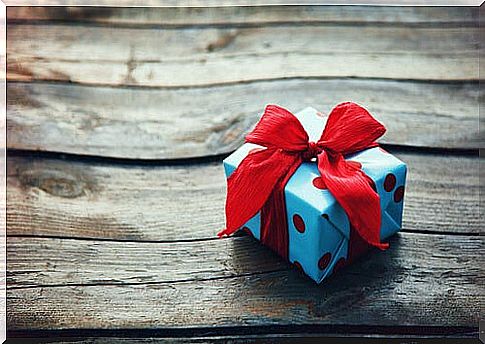 Gift on top of a wooden table