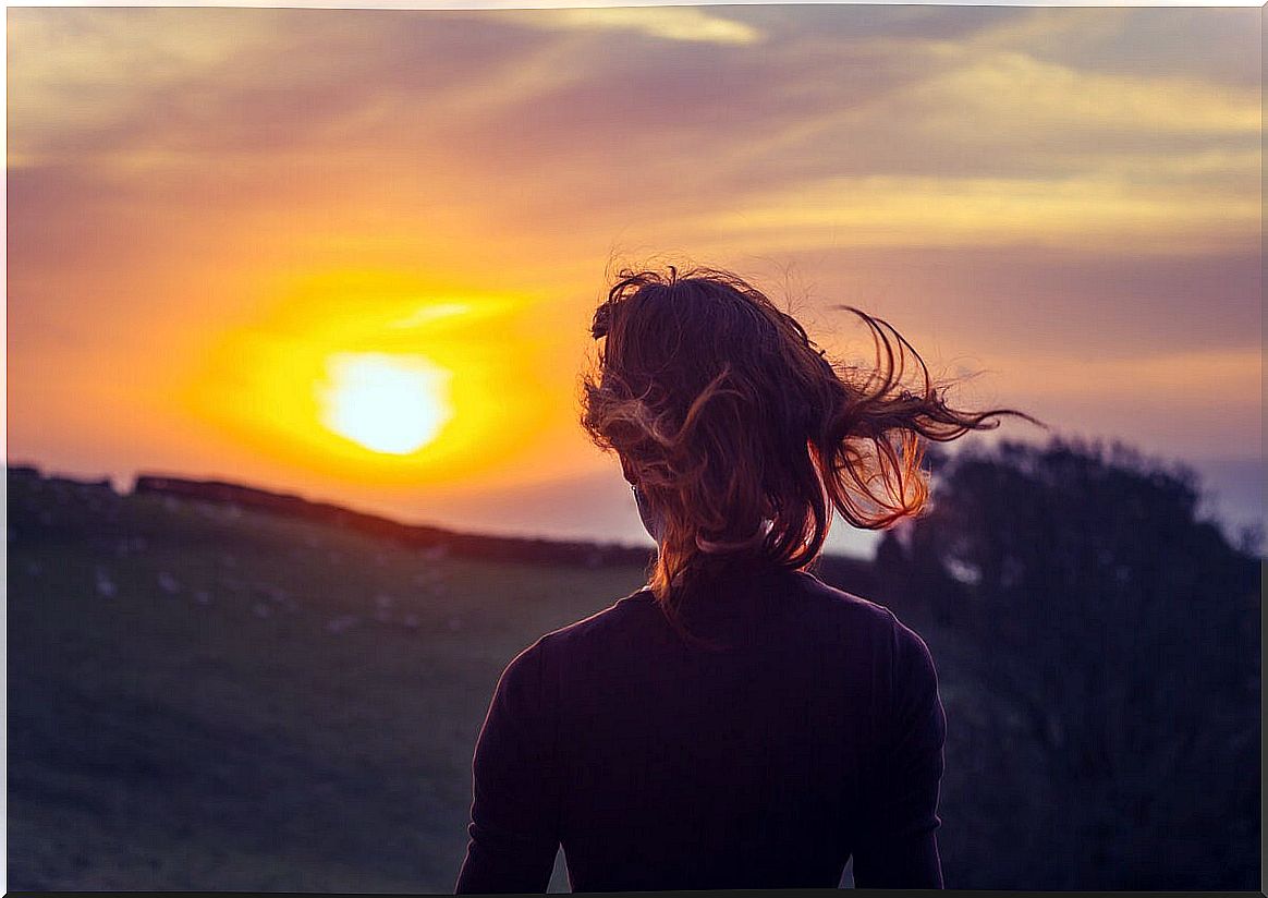 Woman thinking about how to live meaningfully