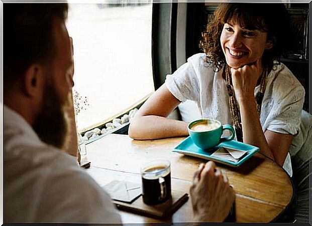 Two friends having coffee