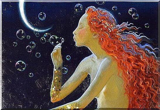 Woman blowing bubbles