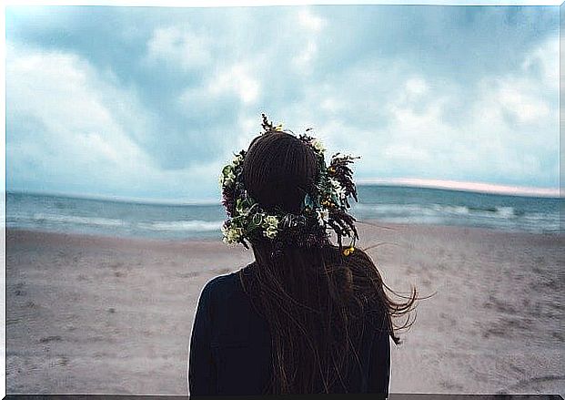 Woman with flower crown from back