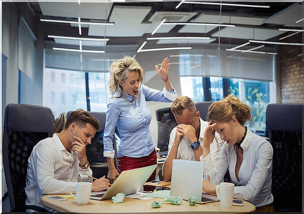 Boss yelling at her employees