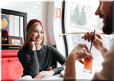 Friends talking while smiling simply