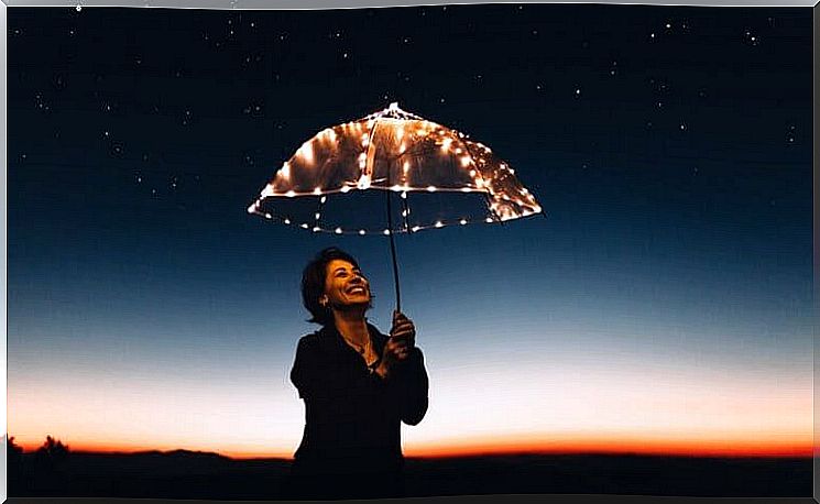 Woman with bright umbrella