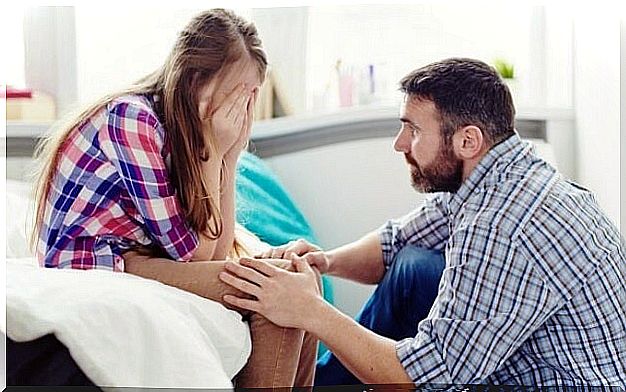 Father and daughter playing the role of parents in eating