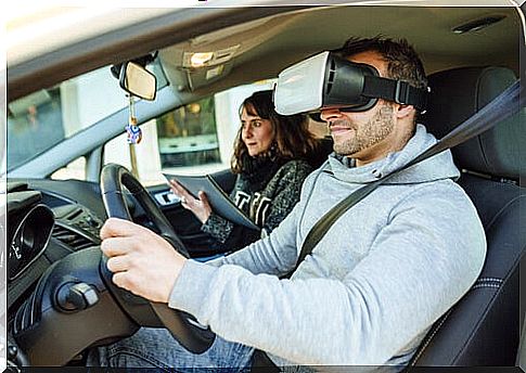 Man with virtual reality glasses driving