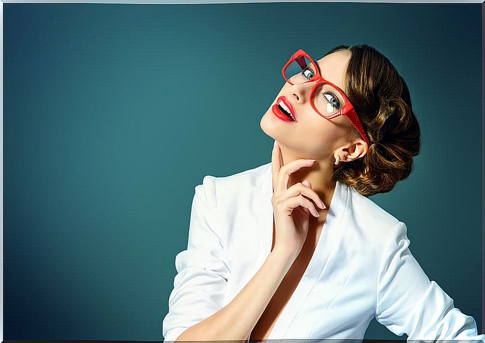 Woman with glasses and light eye color