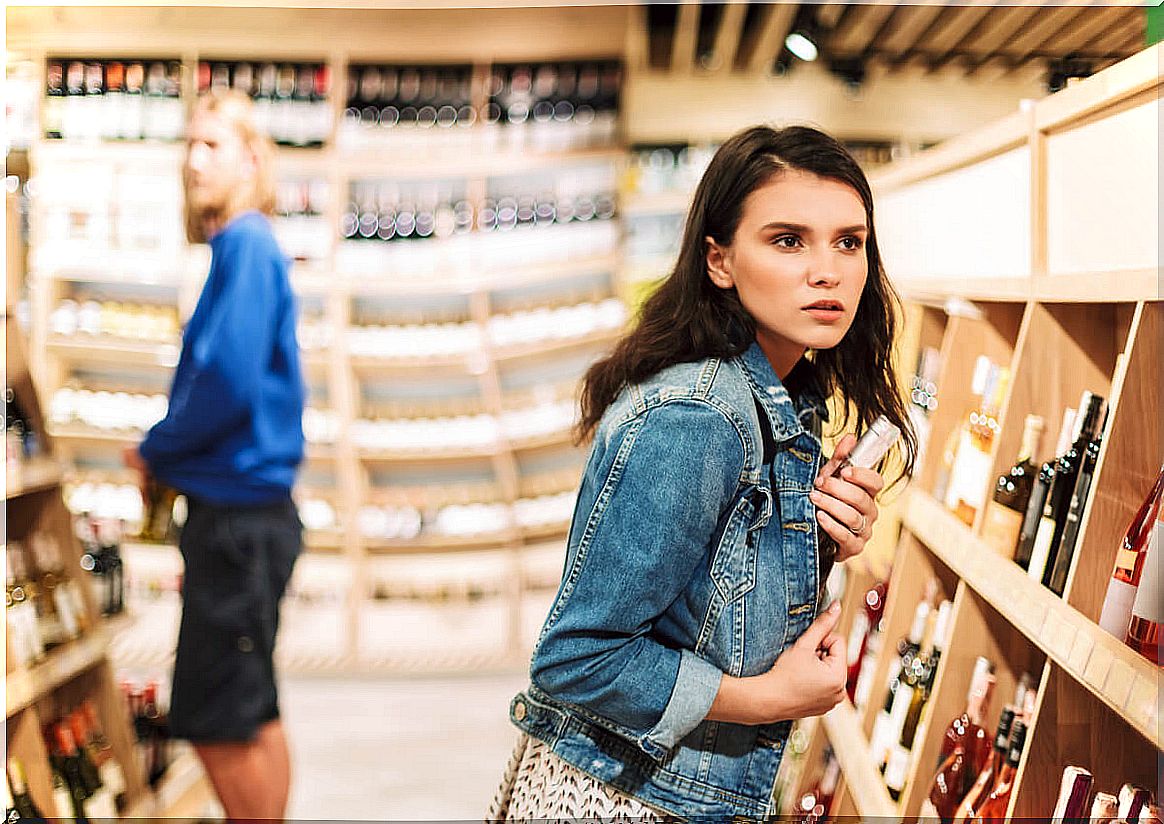 Girl stealing in a supermarket