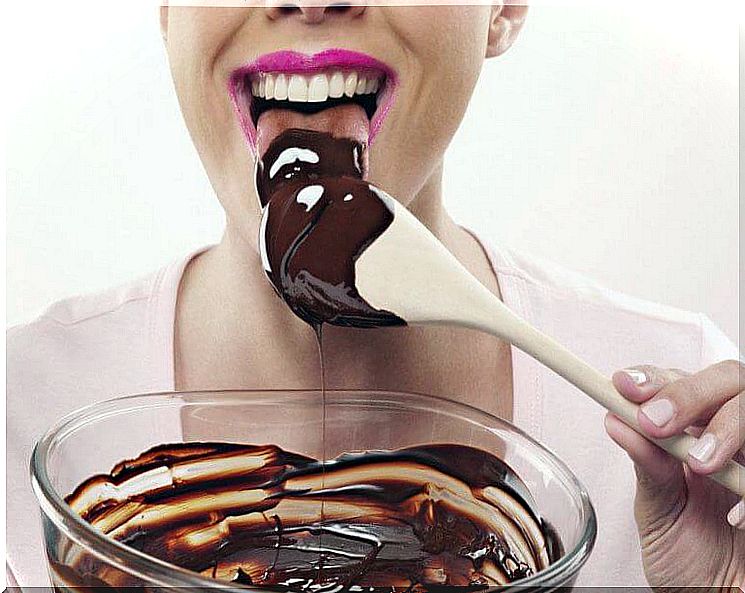 Woman eating chocolate