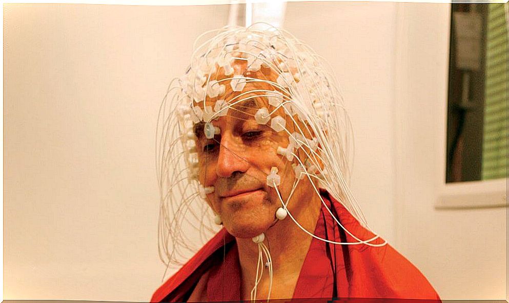 Matthieu Ricard with electrodes on his head