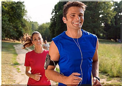 Couple running happy through the field for sports psychology