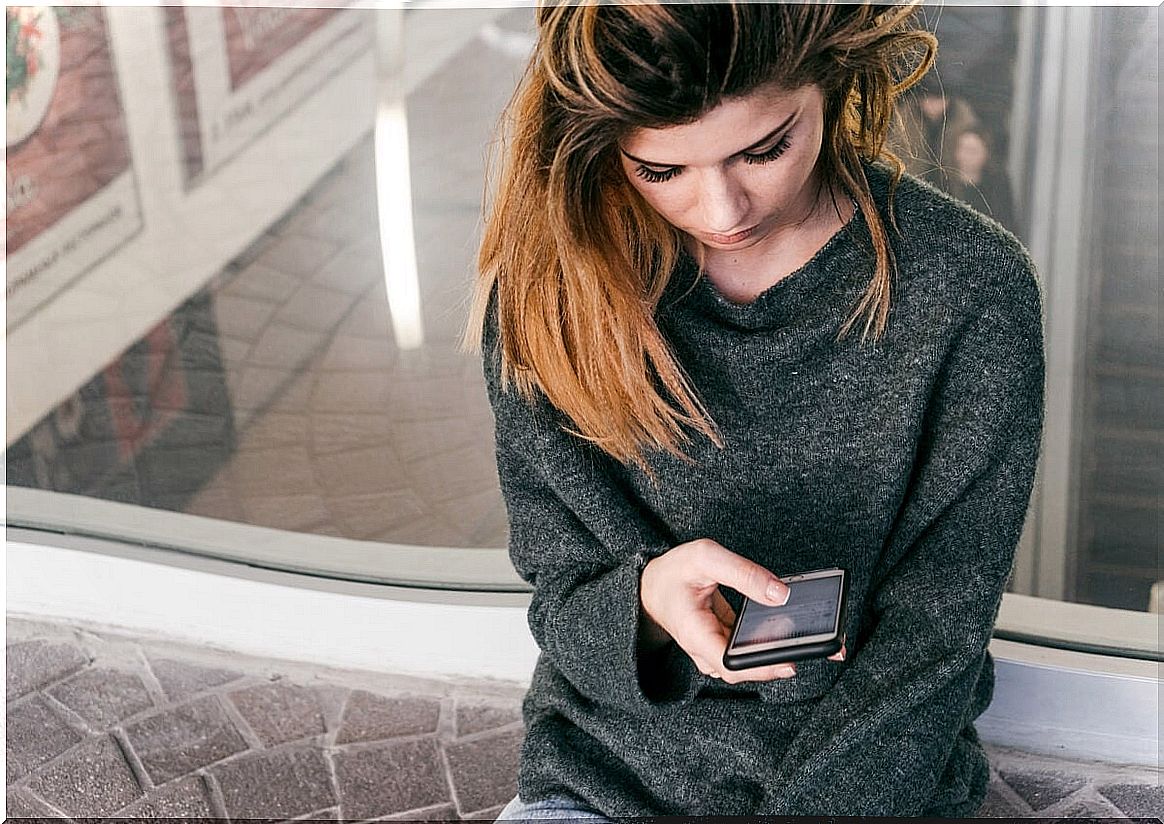 Girl looking at mobile